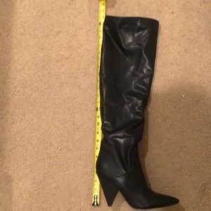 Black Thigh high boot w/slouch.